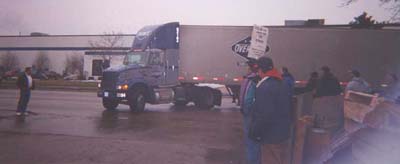 Scab trucker going across our picket line